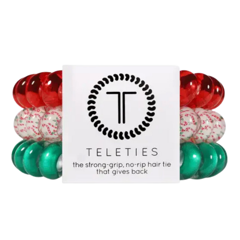 TELETIES - ALL I WANT FOR CHRISTMAS

Hold your hair and enhance your holiday style with TELETIES. The strong grip, no rip hair tie that doubles as a bracelet. Strong, pretty and stylish, TELETIES are designed to withstand everyday demands while taking your look to the next level.