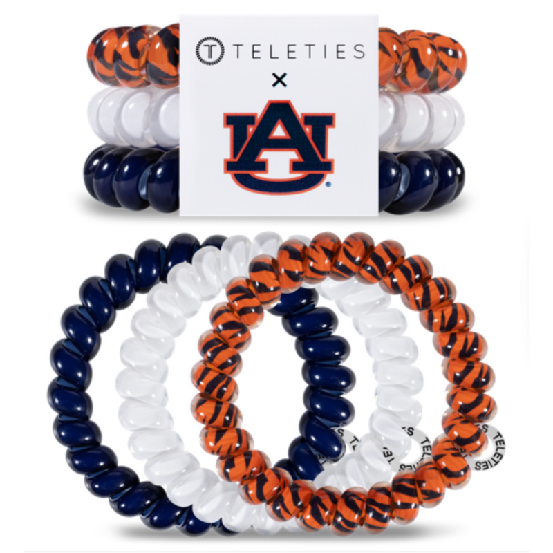 TELETIES - AUBURN UNIVERSITY  On Gameday, hold your hair and enhance your style with TELETIES. The strong grip, no rip hair tie that doubles as a bracelet. Strong, pretty and stylish, TELETIES are designed to withstand everyday demands while taking your Gameday look to the next level.