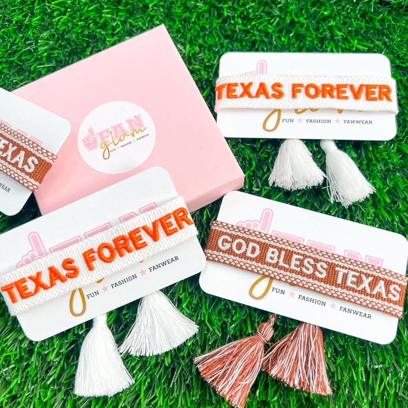 Your team. Your squad. Your identity.    Our Texas Game Day Team Tassels have arrived!   The perfect arm candy addition to take you from tailgate to postgame and everywhere in between!    Don't see your favorite team or team colors? Let us create a custom design for you or your group. E-mail us @hello@shopfanglam.com for more information!