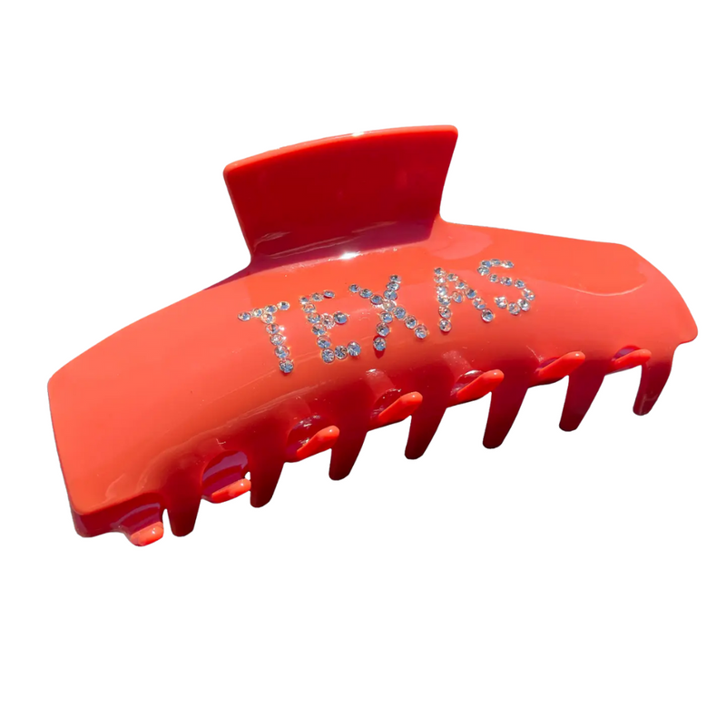 Show off your Texas pride with our new burnt orange claw clip, decked out in dazzling Longhorn bling. Designed to hold strong and shine brighter, it’s the ultimate combo of team spirit and everyday glam. From tailgates to TikToks — this is how Longhorns clip in and stand out.