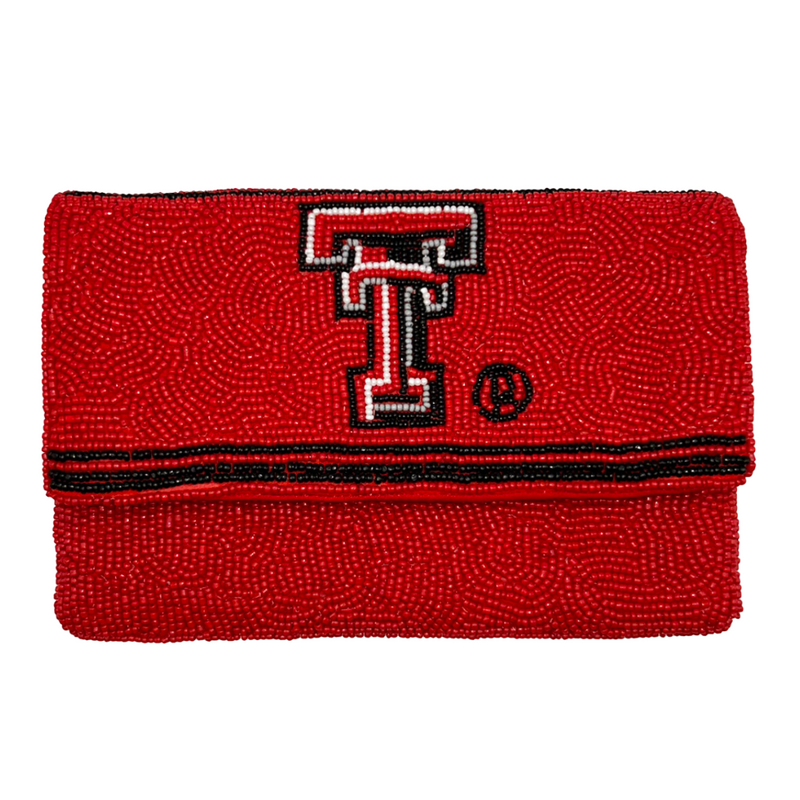 Raider Power!  Saturdays In Lubbock Are For Tortilla Tossing + Guns Up!  There's no better time to elevate your tailgate glam by accessorizing your Game Day look with our iconic Texas Tech University Beaded Mini Clutch.  Stadium sized approved!!  Our Mini clutch features a secure snap closure that keeps your cash, credit cards, lipstick, keys + more safe at the game!
