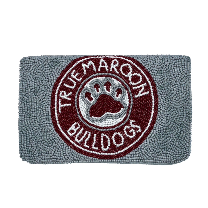 Hail State!  Show your true maroon team spirit when accessorizing your Game Day look with our uniquely beaded True Maroon Mississippi State camera bag. Let's Go Dawgs!  Stadium sized approved!!  Our Mini clutch features a secure snap closure that keeps your cash, credit cards, lipstick, keys + more safe at the game!
