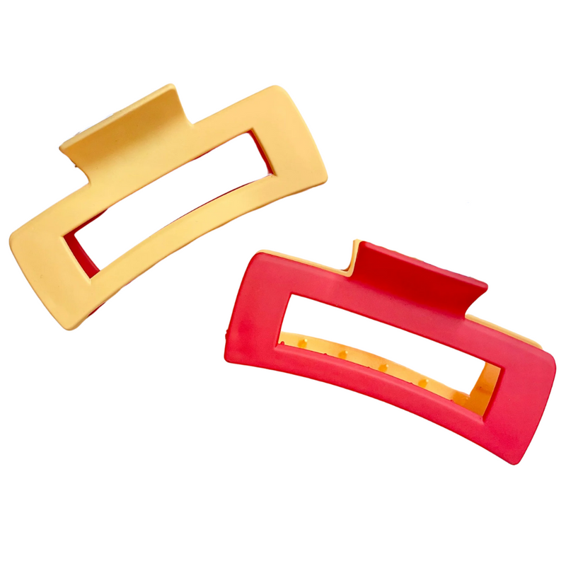 Add a pop of color to your hair game with these bold and playful color block claw clips! Featuring a sleek red and blue combo, these clips are perfect for repping your school pride or just making a statement. With a strong hold and trendy shape, they’re your go-to for effortless game-day glam, campus style, or everyday flair.