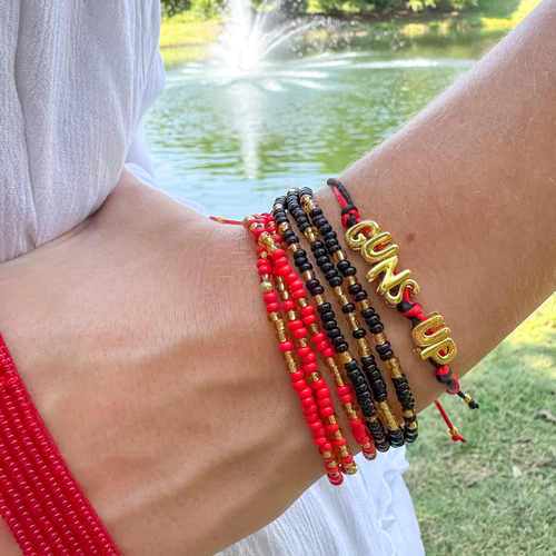 Our new cinch tie bracelets are the perfect pop of Tech glam — stackable, adjustable, and so on trend! Whether you are going to the game, tailgating, or just for fun this tie bracelet is the perfect addition to your stack.&nbsp;
