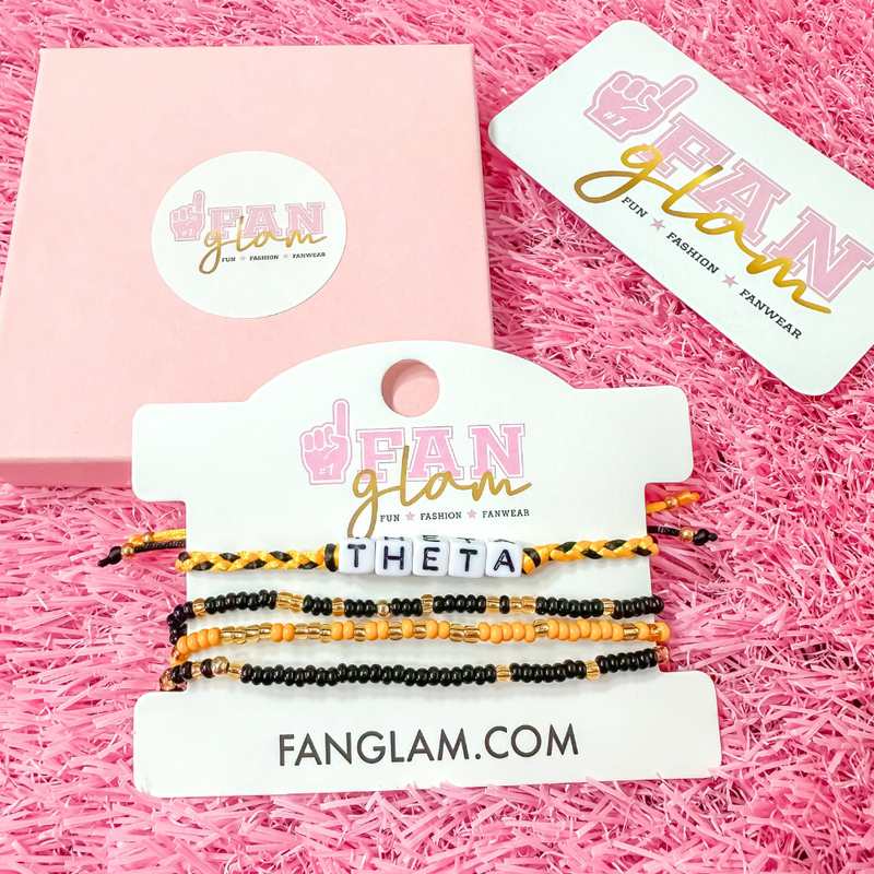 Stack your sorority spirit with the perfect arm candy to rep your sorority in style. &nbsp;Select our classic sorority braided strand for a simple, everyday vibe — or go full-on bold with our 4-strand stack, featuring a mix of stretchy beaded bracelets in fun colors and gold shimmer accents. &nbsp;

Whether you’re dressing up for bid day, big/little reveal, or just flexing your chapter pride, this set has you covered.&nbsp; Wear one or wear them all!