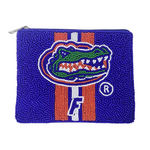 So give a cheer for the Orange + Blue!  It's GameDay in The Swamp and there's no better time to accessorize your Game Day look.  Elevate your clear bag status when styling your clear bag with our uniquely beaded UF Gators coin bag.  Stadium sized approved!!  Coin bag features a secure zip closure that keeps your cash, credit cards, lipstick, keys + more safe at the game!