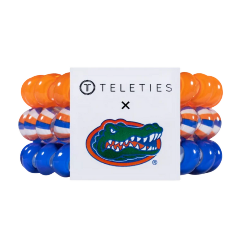 
TELETIES - UNIVERSITY OF FLORIDA

On Gameday, hold your hair and enhance your style with TELETIES. The strong grip, no rip hair tie that doubles as a bracelet. Strong, pretty and stylish, TELETIES are designed to withstand everyday demands while taking your Gameday look to the next level.