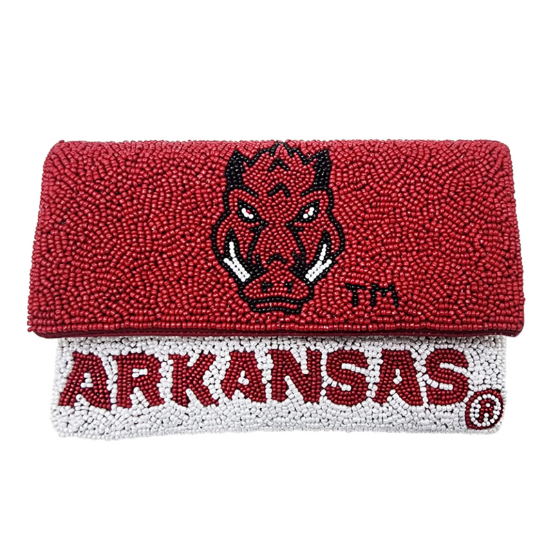 Time to call the hogs, Wooo Pig Sooie it's Game Day!!  There's no better time to elevate your tailgate glam by accessorizing your Game Day fit with our iconic U of A Razorback Beaded Mini Clutch.  Stadium sized approved!!  Our Mini clutch features a secure snap closure that keeps your cash, credit cards, lipstick, keys + more safe at the game!