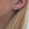 Get&nbsp;ready to stand up&nbsp;and yell,&nbsp;Hey War Eagle! &nbsp;

Show off your school spirit and arrive wearing these War Eagle gold stud earrings. &nbsp;The perfect Game Day accessory to elevate your look and show your team spirit!