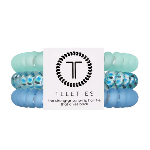 TELETIES - WINTER MAGIC Hold your hair and enhance your holiday style with TELETIES. The strong grip, no rip hair tie that doubles as a bracelet. Strong, pretty and stylish, TELETIES are designed to withstand everyday demands while taking your look to the next level.
