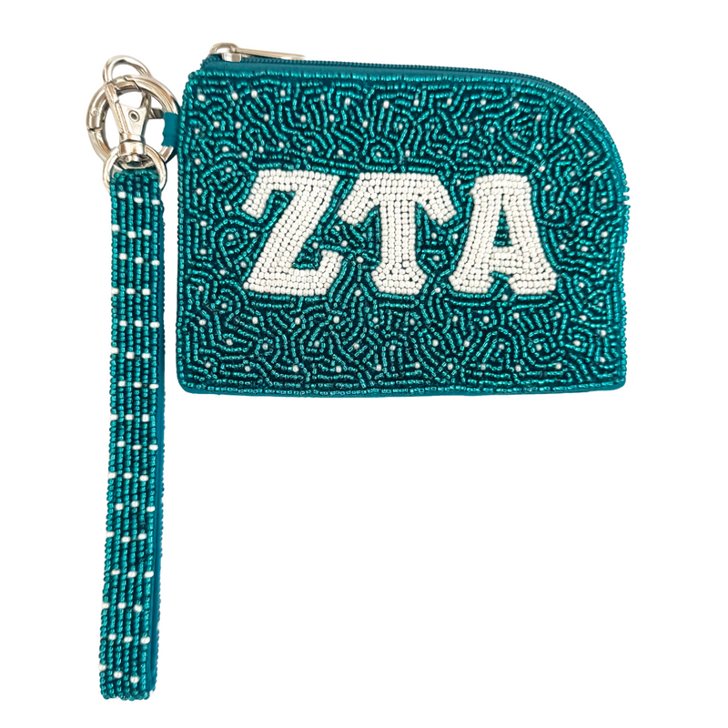 Show your sisterhood spirit in style with our exclusive Zeta Tau Alpha Beaded Bracelet Bag! Designed to be worn on your wrist or clipped to your favorite bag, this lightweight and eye-catching accessory is perfect for any greek event! From Bid Day to Big/Little reveal, it's the perfect way to show off your letters with pride!