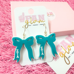 Add the perfect finishing touch to your Bid Day look with our Bid Day Bow Earrings! These bold, lightweight bows are designed to show off your chapter spirit with style and sparkle. Pair them with your favorite Bid Day fit for a look that's full of fun and sisterhood pride!