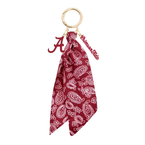 Bring the fun wherever you go with this game day-ready bag charm! Featuring a bold paisley-print bandana, shiny gold hardware, and sporty charm accents, it’s the ultimate way to show your spirit in style. Clip it to your bag, keys, or backpack and let the tailgate vibes follow you everywhere. Perfect for cheering, repping your team, or just adding a pop of personality to your look!
