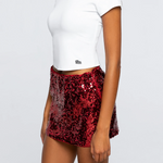 Dazzle the crowd in the Alabama Crimson Tide Sequin Mini Skirt! This sparkling skirt features shimmering sequins and a comfortable stretch fit, with your school name boldly stitched across the back. Perfect for showing off your team spirit in style, it’s not just a skirt—it’s your cheer squad’s secret weapon.