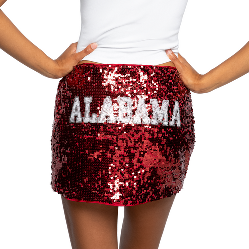 Dazzle the crowd in the Alabama Crimson Tide Sequin Mini Skirt! This sparkling skirt features shimmering sequins and a comfortable stretch fit, with your school name boldly stitched across the back. Perfect for showing off your team spirit in style, it’s not just a skirt—it’s your cheer squad’s secret weapon.