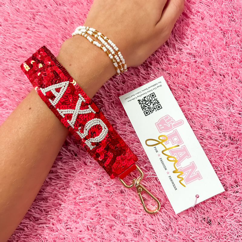 Greek Glam just dropped! This wristlet is serving sparkle, shine, and serious sorority energy — fully sequined and reppin’ your letters loud and proud.&nbsp;Whether you’re heading to chapter, running to class, or getting gift-ready for Bid Day or Big/Little, this piece brings the perfect pop of sorority style. Clip it on, show it off, and let your Greek girl era shine&nbsp;