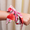 Calling all AOII sisters! This silky scarflette is your new BFF for flaunting those cardinal red and white connections! Wrap it around your bag for a pop of pizzazz, twist it in your hair for sorority-chic vibes, or rock it as a neck accessory that screams "yes, I'm fabulous AND in Alpha Omicron Pi!" Perfect for gifting to your ride-or-die sisters or treating yourself to a daily dose of AOII magic. Because nothing says "I crushed sorority life" quite like this playful piece of wearable sisterhood!