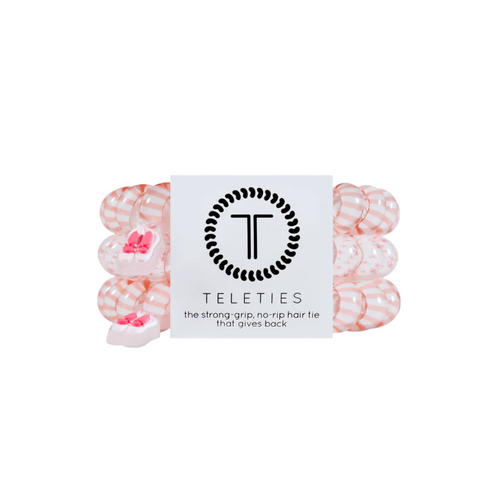 On Gameday, hold your hair and enhance your style with TELETIES. The strong grip, no rip hair tie that doubles as a bracelet. Strong, pretty and stylish, TELETIES are designed to withstand everyday demands while taking your Gameday look to the next level.