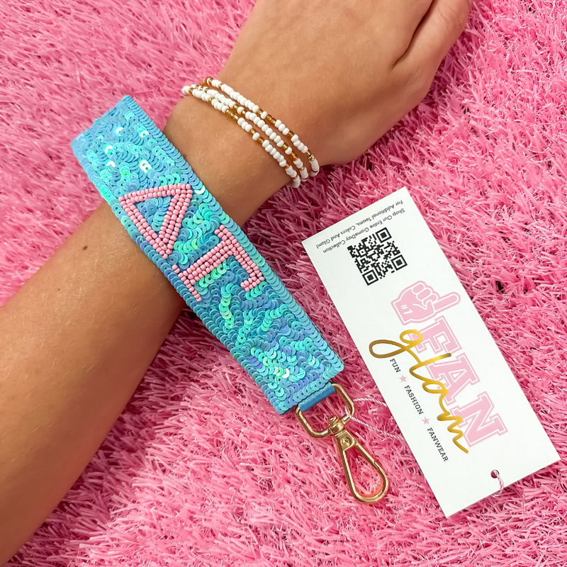 Greek Glam just dropped! This wristlet is serving sparkle, shine, and serious sorority energy — fully sequined and reppin’ your letters loud and proud.&nbsp;Whether you’re heading to chapter, running to class, or getting gift-ready for Bid Day or Big/Little, this piece brings the perfect pop of sorority style. Clip it on, show it off, and let your Greek girl era shine&nbsp;