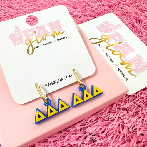 Wear your letters. Live your legacy. Love your style.

Add a little charm to your everyday look with our Delta Delta Delta Charmed Life Huggies!&nbsp;Featuring your Greek Letters in a bold yet dainty way, these lightweight huggie hoops are perfect for every moment, and made to celebrate your chapter with bold colors and shiny details all semester long.