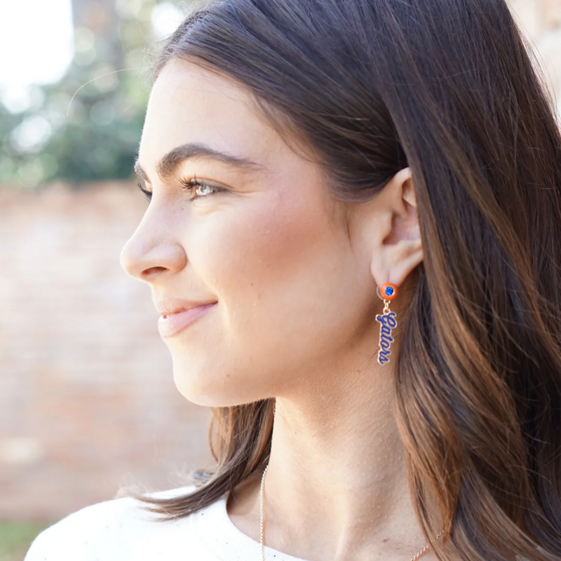 Show off your Florida Gators pride with these playful Autograph Enamel Earrings. Lightweight and polished, they add a spirited touch to your game day outfit or everyday look. Perfect for fans who want a stylish, subtle way to celebrate their team anywhere they go.