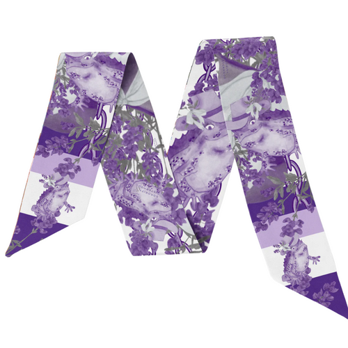 This scarflette brings big Fort Worth energy with a splash of Tarleton charm! Featuring soft floral details in bold shades of purple, it’s sprinkled with playful horse silhouettes — a sweet nod to the spirited Texan way of life. Whether you’re on campus, headed to a rodeo, or just reppin’ Purple Poo vibes around town, this silky accessory is your new go-to for adding that hometown sparkle.