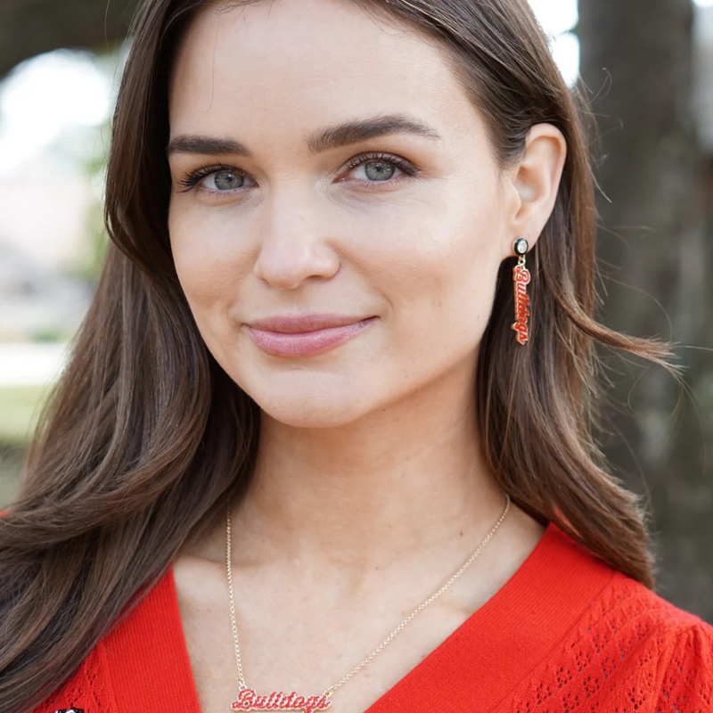 Show off your Georgia Bulldogs pride with these playful Autograph Enamel Earrings. Lightweight and polished, they add a spirited touch to any look, whether you're cheering at the game or going about your day. Perfect for fans who like to combine style with team spirit!