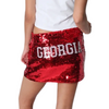 Sparkle louder with the Georgia Bulldogs Sequin Mini Skirt! This flirty mini skirt dazzles with shimmering sequins and a hint of stretch for comfort. Finished with your school name stitched across the back, it’s perfect for showing off your team spirit in style. Whether you’re cheering in the stands or heading out with friends, this skirt lets everyone know exactly who you’re rooting for.