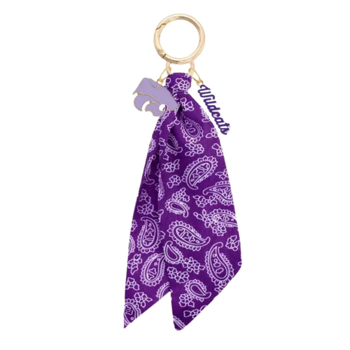 Bring the fun wherever you go with this game day-ready bag charm! Featuring a bold paisley-print bandana, shiny gold hardware, and sporty charm accents, it’s the ultimate way to show your spirit in style. Clip it to your bag, keys, or backpack and let the tailgate vibes follow you everywhere. Perfect for cheering, repping your team, or just adding a pop of personality to your look!