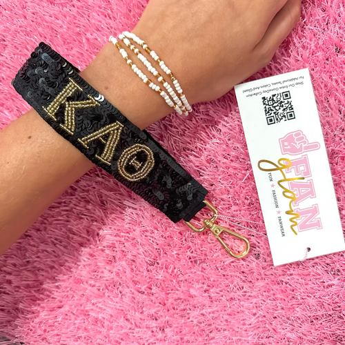 Greek glam just dropped! This wristlet is serving sparkle, shine, and serious sorority energy — fully sequined and reppin’ your letters loud and proud.&nbsp;Whether you’re heading to chapter, running to class, or getting gift-ready for Bid Day or Big/Little, this piece brings the perfect pop of sorority style. Clip it on, show it off, and let your Greek girl era shine&nbsp;