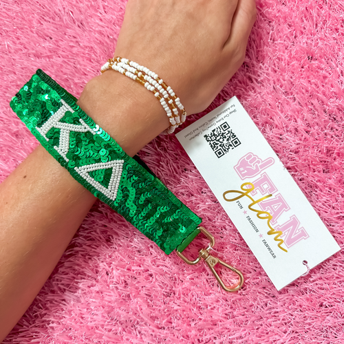 Greek glam just dropped! This wristlet is serving sparkle, shine, and serious sorority energy — fully sequined and reppin’ your letters loud and proud.&nbsp;Whether you’re heading to chapter, running to class, or getting gift-ready for Bid Day or Big/Little, this piece brings the perfect pop of sorority style. Clip it on, show it off, and let your Greek girl era shine&nbsp;