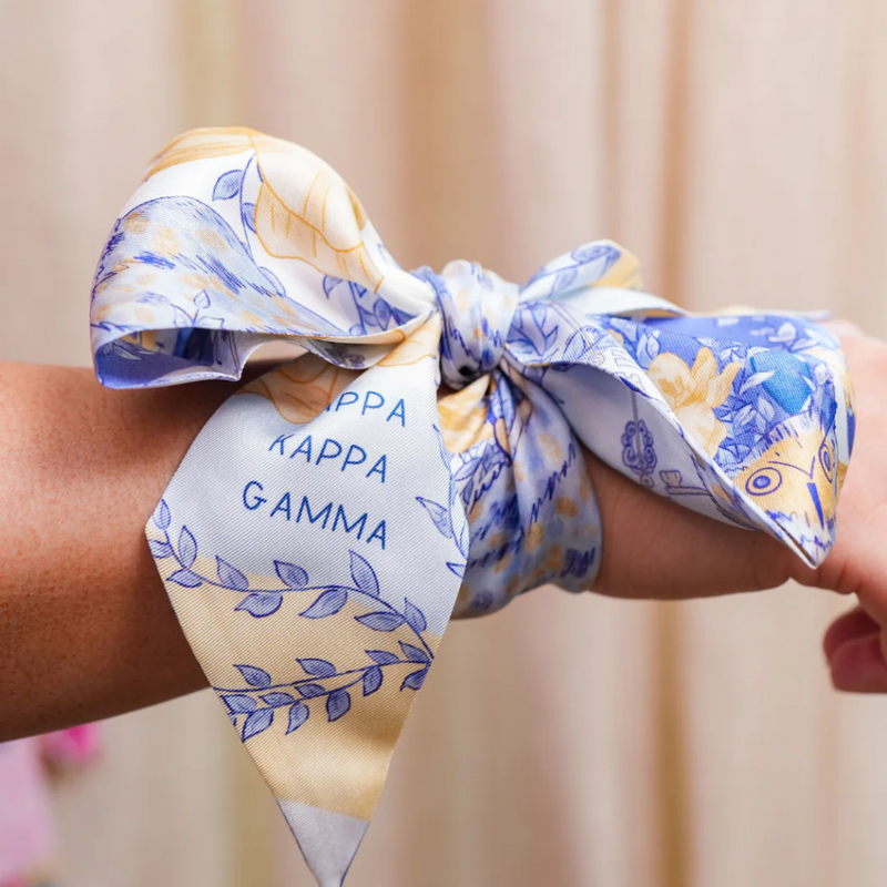 Show off your Kappa Kappa Gamma spirit with this chic silk scarflette! Whether you're heading to a sorority mixer, jazzing up your daily outfit, or hunting for the perfect gift for your favorite Kappa sister, this versatile accessory adds a splash of sisterhood to any look. It's the fun way to flaunt your Kappa pride while turning heads on campus!
