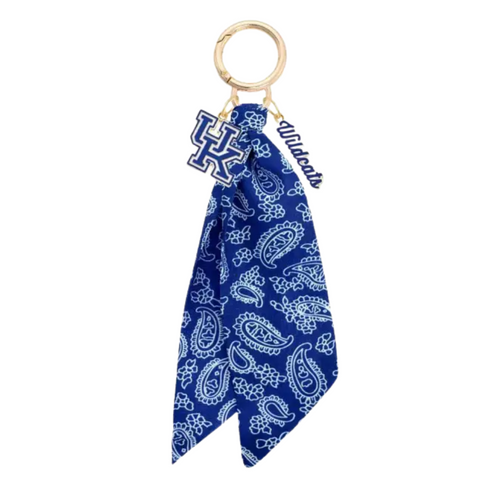 Bring the fun wherever you go with this game day-ready bag charm! Featuring a bold paisley-print bandana, shiny gold hardware, and sporty charm accents, it’s the ultimate way to show your spirit in style. Clip it to your bag, keys, or backpack and let the tailgate vibes follow you everywhere. Perfect for cheering, repping your team, or just adding a pop of personality to your look!