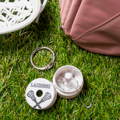 Keep your rings, earrings, and necklaces safe and sound inside the Lion Latch-Lacrosse while you’re out on the field! This playful accessory is perfect for lacrosse players who want to protect their favorite small jewelry during the game. Stay stylish and worry-free with the Lion Latch designed to keep your treasures secure no matter how intense the play gets!