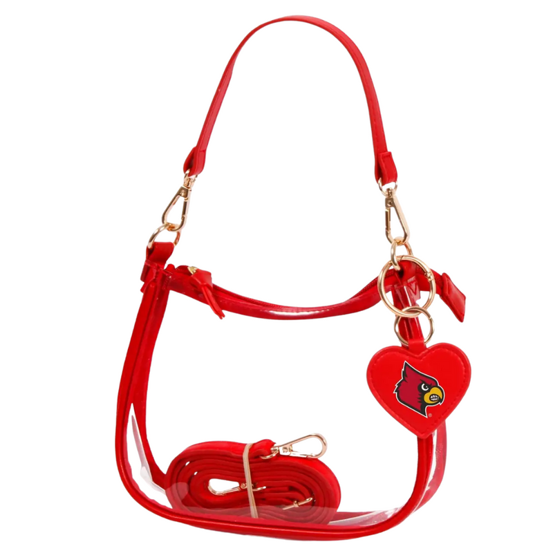Our new Clara Clear Bag perfectly blends function and fashion, meeting stadium regulations with a chic design. It features a durable PVC body, secure zipper closure, and two interchangeable straps, keeping your essentials stylish and secure on game day.&nbsp;