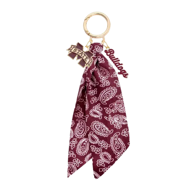 Show off your Mississippi State Bulldogs pride with this fun and stylish Logo Bandana Bag Charm. Perfect for adding a playful touch to your bag, it’s a great way to keep your team spirit close wherever you go. Lightweight and easy to attach, this charm makes every day a little more spirited!