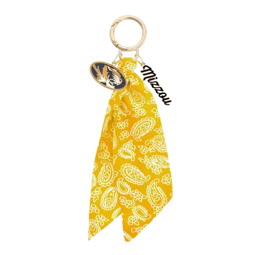 Show off your Missouri Tigers pride with this playful Logo Bandana Bag Charm. Perfect for adding a splash of school spirit to your bag, it’s a fun and stylish way to keep your essentials close while cheering on your team. Lightweight and easy to attach, this charm brings a touch of Tigers flair wherever you go!