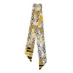Show off your Mizzou pride with this playful Missouri Tigers Silk Scarflette. Made from smooth, luxurious silk in bold black and gold, it features striking tiger motifs and delicate floral designs that capture the spirit of the Tigers and the beauty of Missouri. Perfect for adding a splash of school spirit to any outfit, this scarflette is as fun as it is fashionable.