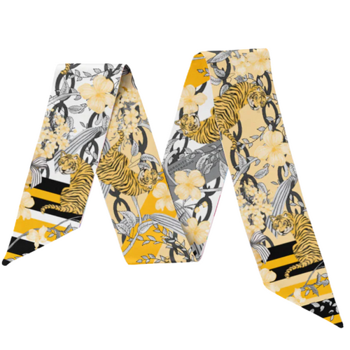 Show off your Mizzou pride with this playful Missouri Tigers Silk Scarflette. Made from smooth, luxurious silk in bold black and gold, it features striking tiger motifs and delicate floral designs that capture the spirit of the Tigers and the beauty of Missouri. Perfect for adding a splash of school spirit to any outfit, this scarflette is as fun as it is fashionable.