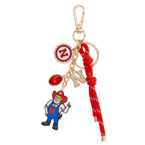 Celebrate your Nebraska Cornhuskers spirit with this lively cluster bag charm! Bright and cheerful, it adds a fun splash of team pride to your purse, backpack, or keys. Lightweight and easy to clip on, it’s the perfect playful accessory for any devoted fan to carry their enthusiasm wherever they go.