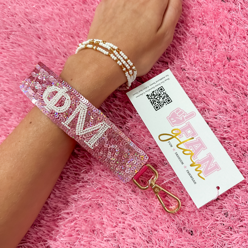 Greek Glam just dropped! This wristlet is serving sparkle, shine, and serious sorority energy — fully sequined and reppin’ your letters loud and proud.&nbsp;Whether you’re heading to chapter, running to class, or getting gift-ready for Bid Day or Big/Little, this piece brings the perfect pop of sorority style. Clip it on, show it off, and let your Greek girl era shine&nbsp;