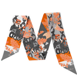 Celebrate your Cowboy spirit with the Stillwater, Oklahoma Silk Scarflette! This chic accessory brings a splash of Poke pride to any look. Ideal for cheering at the game, wandering campus, or showing off your Stillwater style wherever you go. Crafted from silky-soft fabric that’s as fun and lively as a touchdown celebration – let’s go Pokes!