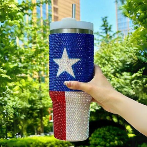 Nothing says "Don't Mess With Texas" more than our Lone Star Texas Flag Blinged Out Crystal Rhinestone Tumbler.  This stylish accessory is the perfect addition to your festive holiday get togethers and summer BBQ's! &nbsp;This Summer, sip in style every day all day and stay refreshed and hydrated all while being GLAM!