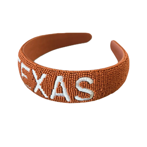 Add a splash of fun to your game day look with this hand-beaded Texas Longhorns headband. Featuring an embroidered school name, it’s the newest version of our fan-favorite style—perfect for showing off your team pride with a playful twist!