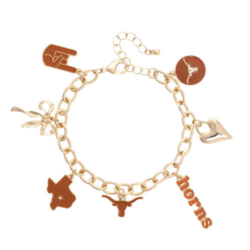 Show off your Texas Longhorns pride with this playful gold-plated Enamel Icons Charm Bracelet. Featuring a lively mix of enamel charms—including the iconic Longhorn logo—this bracelet adds a spirited touch to any outfit. Perfect for stacking on game day or as a fun, season-long accessory to celebrate your team in style.