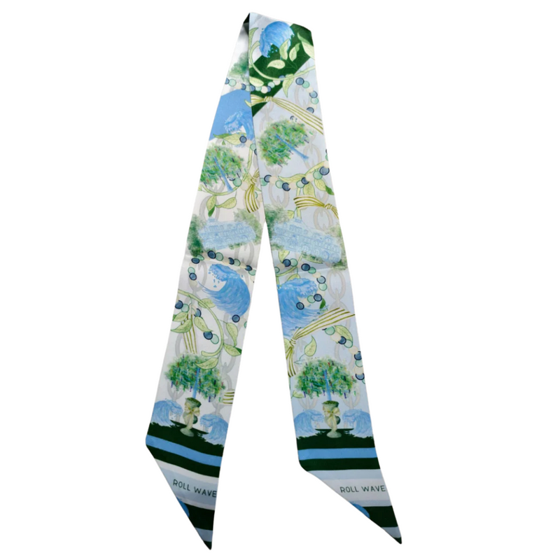 Green Wave glam, NOLA style 💚⚜️
This Tulane-inspired scarflette is full of charm, color, and Crescent City cool. With a delicate floral pattern in shades of green and blue and playful wave and fleur-de-lis accents, it’s a flirty nod to Uptown vibes and Green Wave pride. Whether you're heading to campus, parading down St. Charles, or cheering on the Wave at Yulman, this silky little accessory adds a dash of Tulane spirit to every look.

Crafted from luxe 100% silk twill, it's as versatile as it is vibrant —