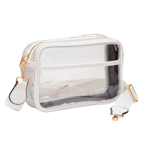 Glitter and Shine on the sidelines when styling your Game Day look with our NEW Rhinestone Clear Crossbody Zip Top Bag! &nbsp;

Featuring a clear PVC body adorned with rhinestones and gold metal accents.&nbsp; Comfortable and roomy, this bag is perfect for the Game Day girl who likes to come prepared!