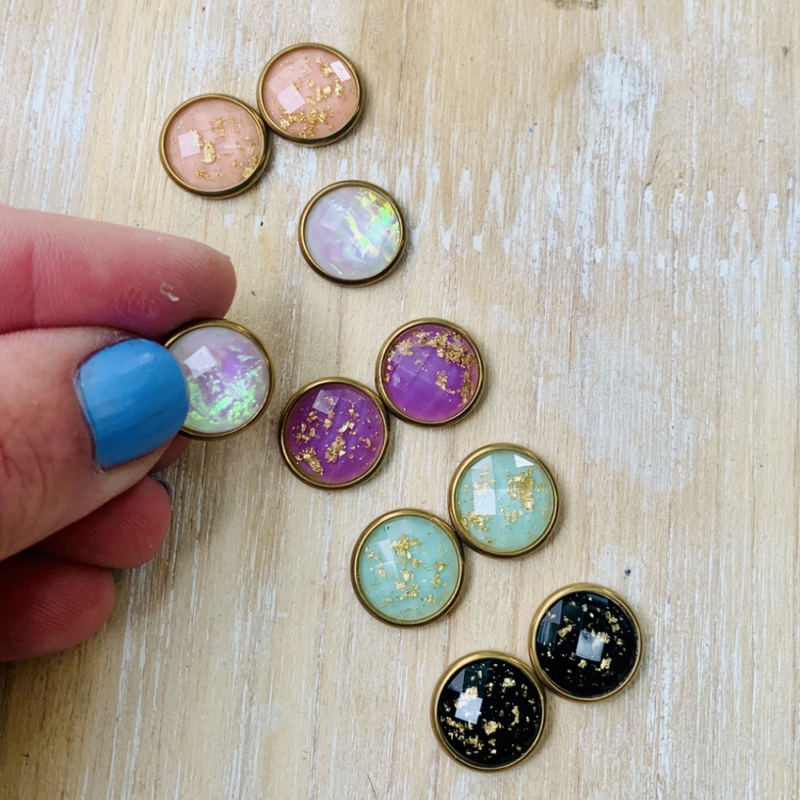 Add a little sparkle to your everyday with our Sweet + Chic gold flecked circle studs! 
