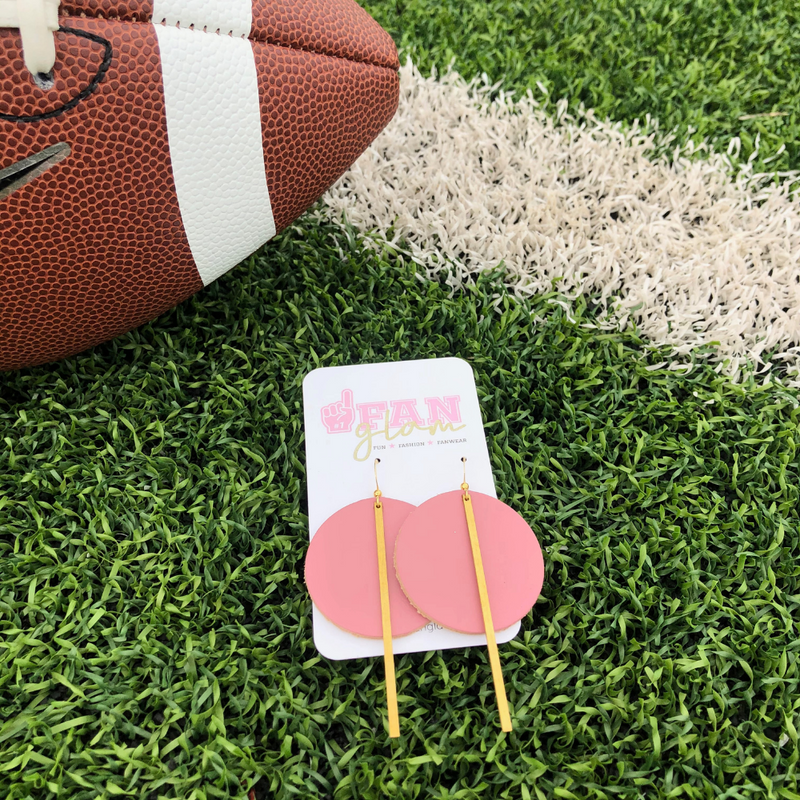 Our Fan Glam Lollipop earrings in Blush are simply chic and oh so sweet! Which color will you wear to the tailgate this week?