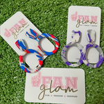 Fit for a queen!  Our Game Day Tam Clay Co Autumn Dangles are just that.  You too can now shimmer and shine on the sidelines with Miss OSU!  The perfect way to add team color and a fun pop of print to your game day attire.